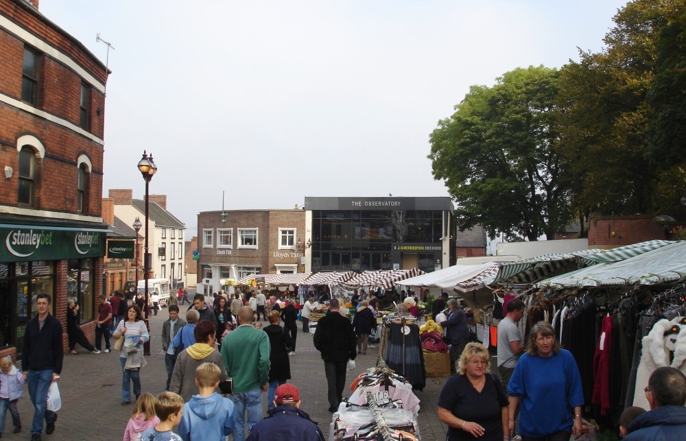 Photograph of Lower Market Place, Ilkeston, Derbyshire on Market Day.