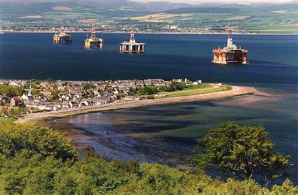 View of the Oil Rigs in the Cromarty Firth looking over the village of Cromarty