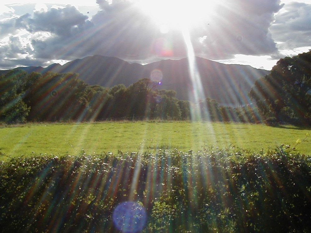 Photograph of From Castlerigg farm campsite, looking towards cat bells. Lake District