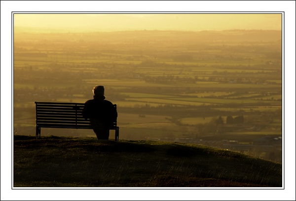 View from Cleeve Hill, Gloucestershire, at sunset, looking across Bishops Cleeve & beyond