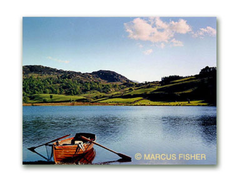 Rowboat on Watendlath Tarn, Watendlath (by Derwent Water), Lake District. County Cumbria, England