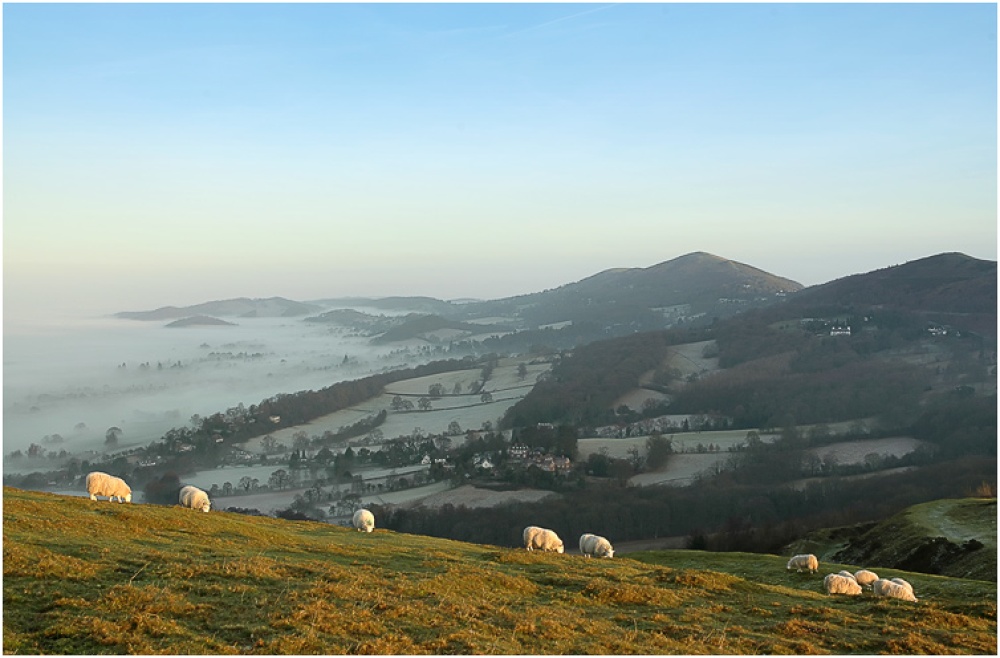 Photograph of Sunrise from British Camp across the Malvern Hills