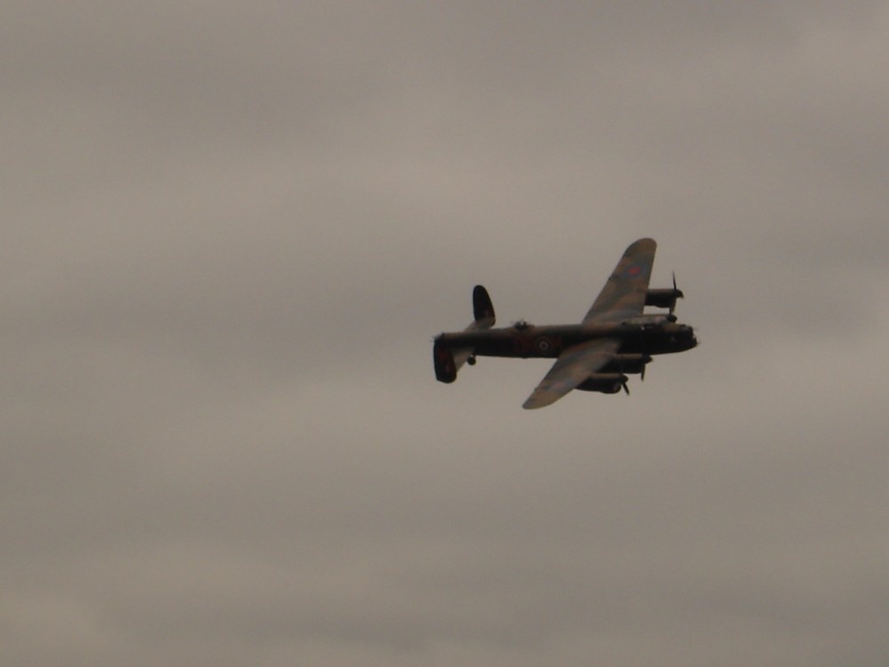 The Lancaster Bomber flys over, Yorkshire Air Museum, Elvington, North Yorkshire.