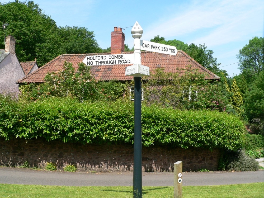 Photograph of A sign post in the village of Holford on the edge of the Quantock hills in somerset