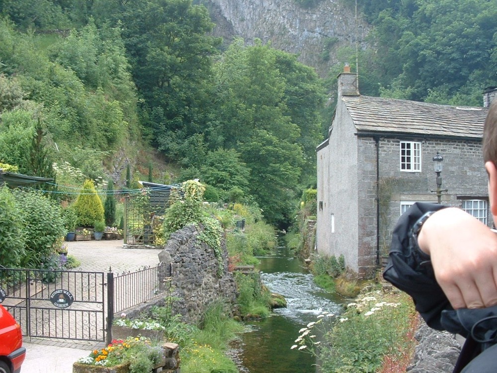 Looking towards Peak Cavern from the river at Castleton photo by Lynn Cawley
