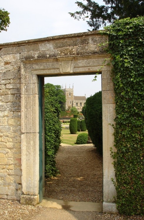 Church and gardens at Belton House, nr. Grantham, Lincolnshire