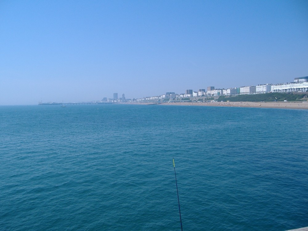 view from Brighton Marina wall looking back towards the pier.
