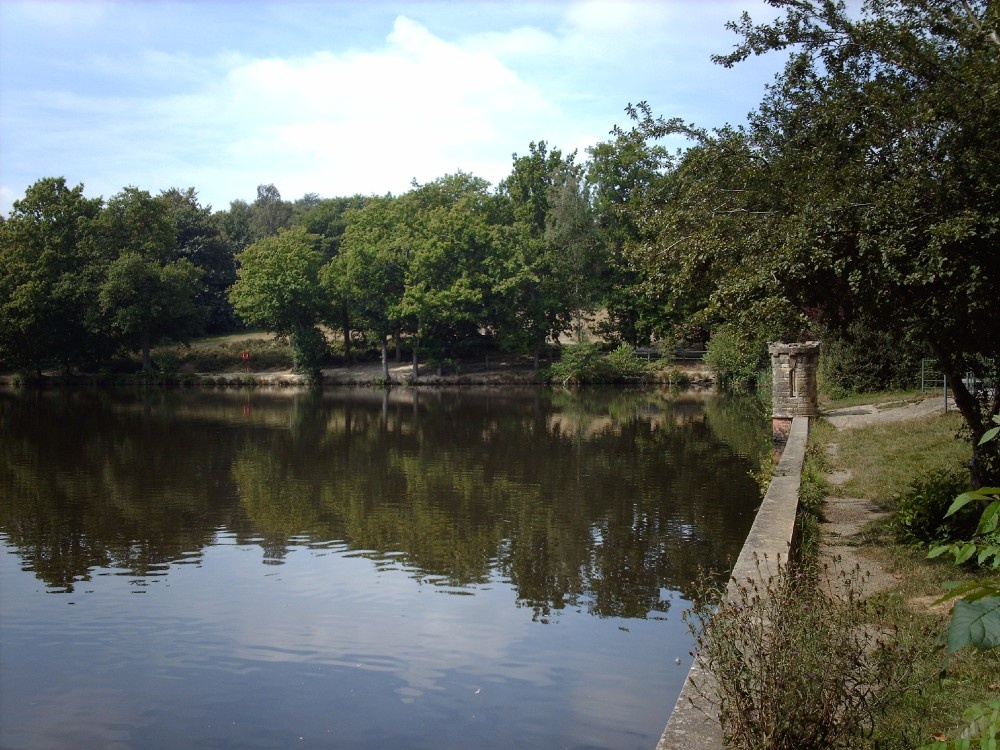 the main wall of the lake in Buchan park, Crawley, Sussex.
