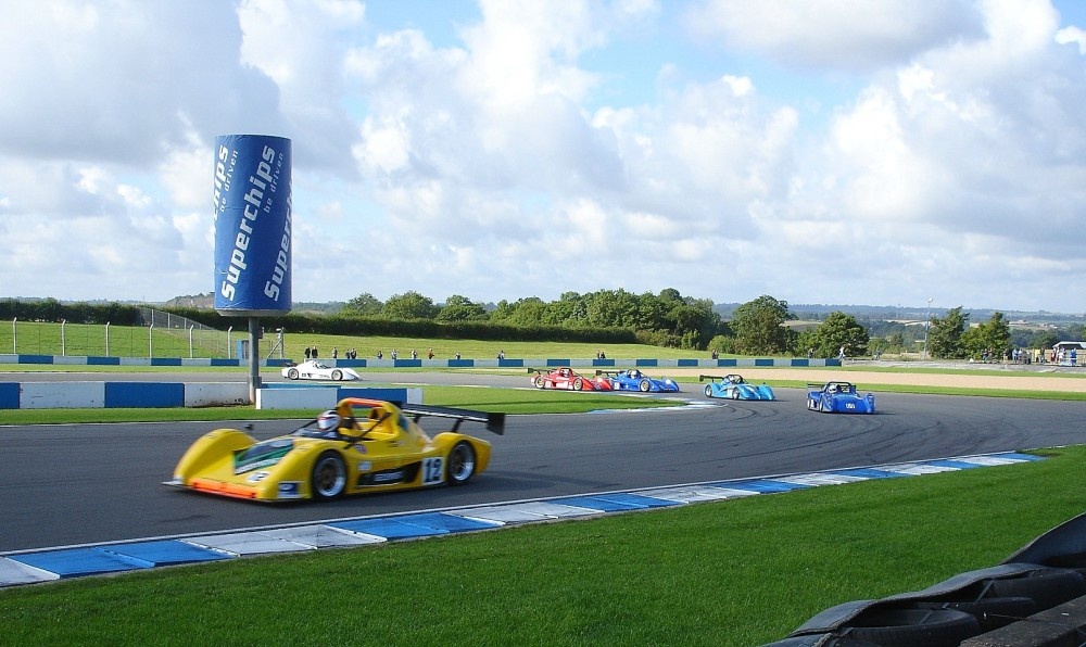 Radical series racers at the Melbourne Hairpin, Donington Park Circuit, Derbyshire