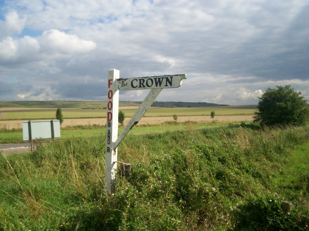 Photograph of Fingerpost pointing to one of the pubs at Broad Hinton, Wiltshire