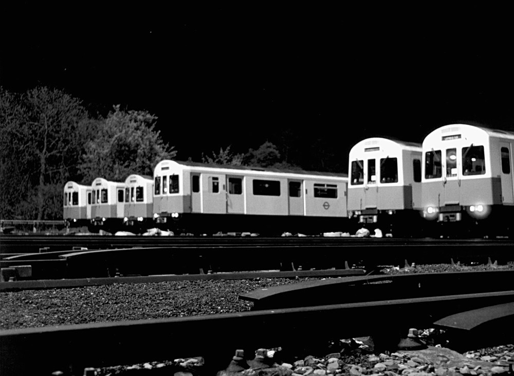 Trains stabled at Upminster underground train depot at about 4.00am. Essex. in the early 1980s.