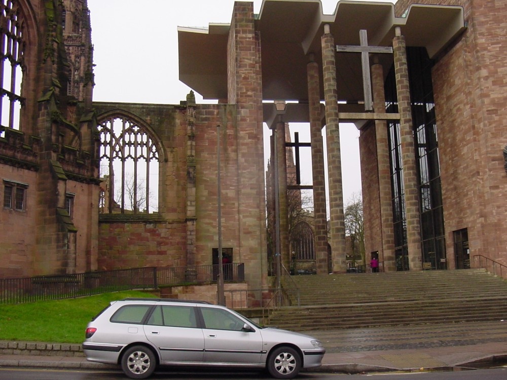 The exterior of the old cathedral, on the left, meets the new Coventry Cathedral, Winter 2002.