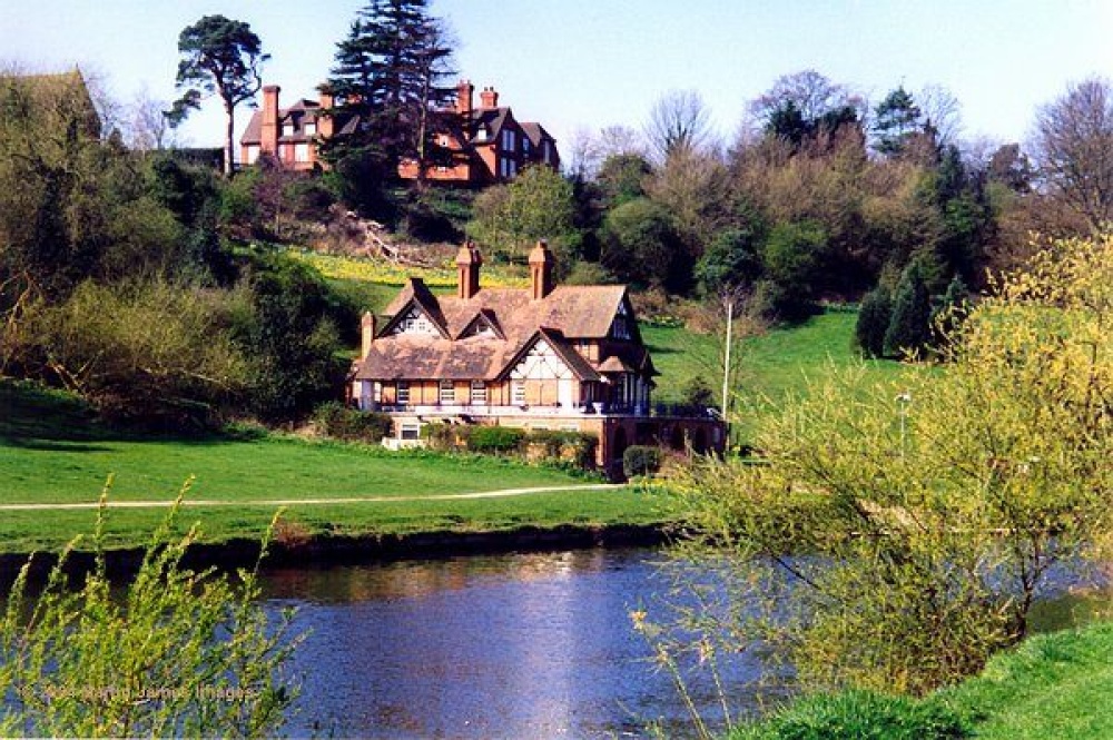 River Severn, Shrewsbury, Shropshire. Boathouse and Shrewsbury School, seen from 'The Quarry'.