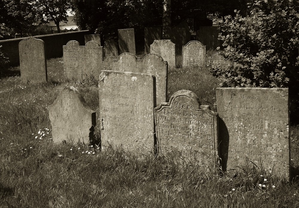Ancient gravestones in Edwinstowe Churchyard, Nottinghamshire.