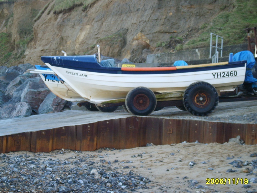 Photograph of Inshore fishing (crab and Lobster)boats on the staithe at East Runton, Norfolk