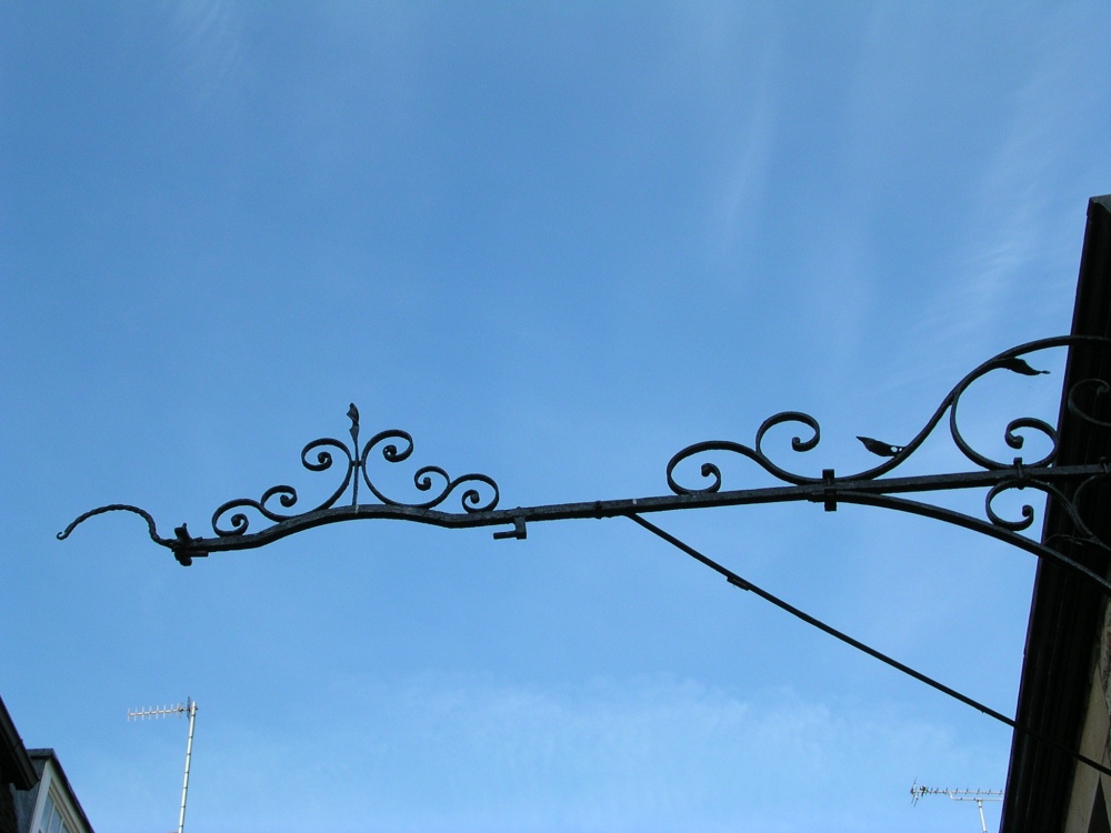 Crown Inn at Stamford, Lincolnshire - detail of ironwork of former inn sign hanger