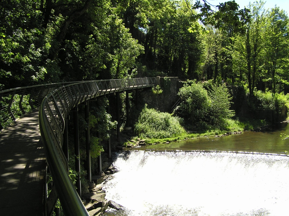 Photograph of The Millenium bridge on the river Goyt. New Mills, Derbyshire.