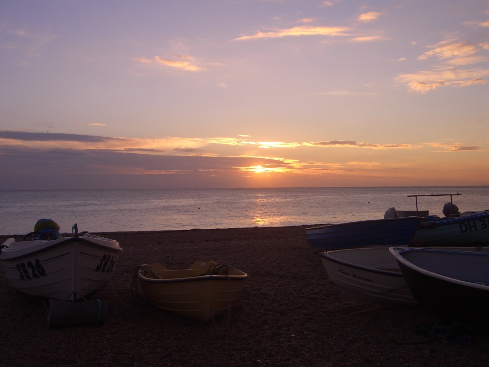 Photograph of October sunrise from Hallsands beach, Devon.