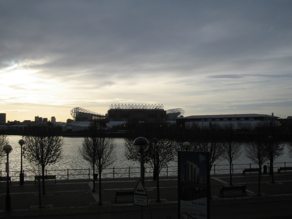 Manchester United Football Ground From Salford Quays, Salford, Greater Manchester.
