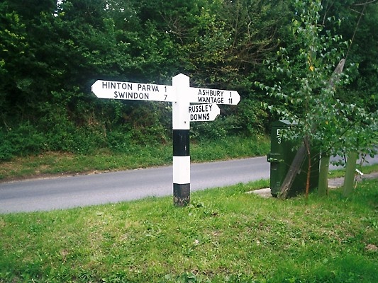 Traditional direction sign at Bishopstone, a picture postcard village near Swindon, Wiltshire
