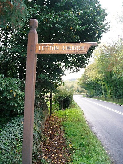 Churchgoers this way: fingerpost on the main road at Letton, Herefordshire