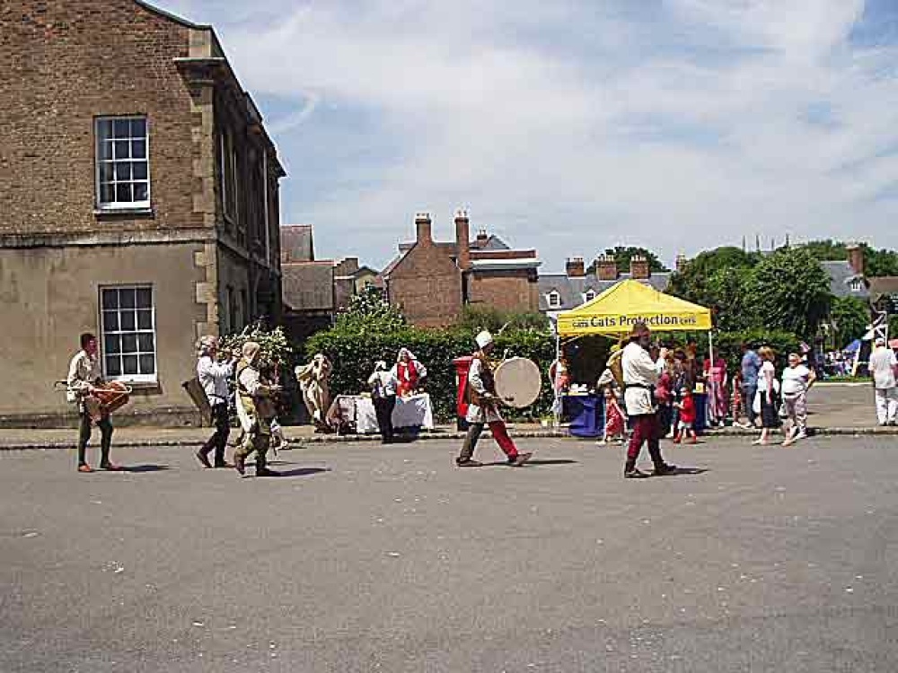 A procession of musicians at the Medieval Fayre in Gloucester in June 2006.