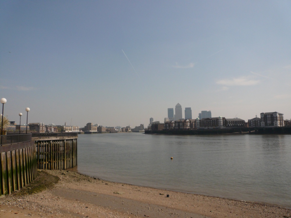 View to Canary Wharf from Wapping along the thames path in london's east end