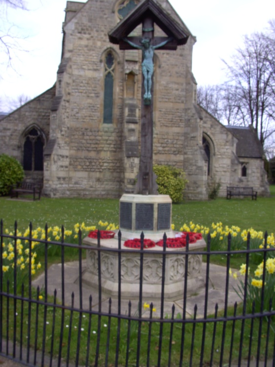War memorial in the church grounds in Shireoaks in Nottinghamshire.