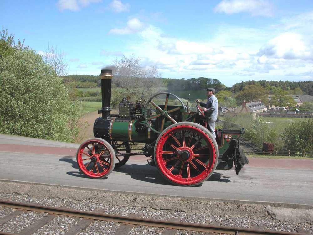 Steam at Beamish Open Air Museum with cottages in the background. Taken 6 May 2007