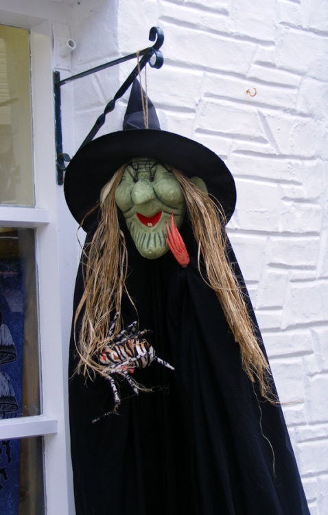 Outside a shop in Polperro, Cornwall