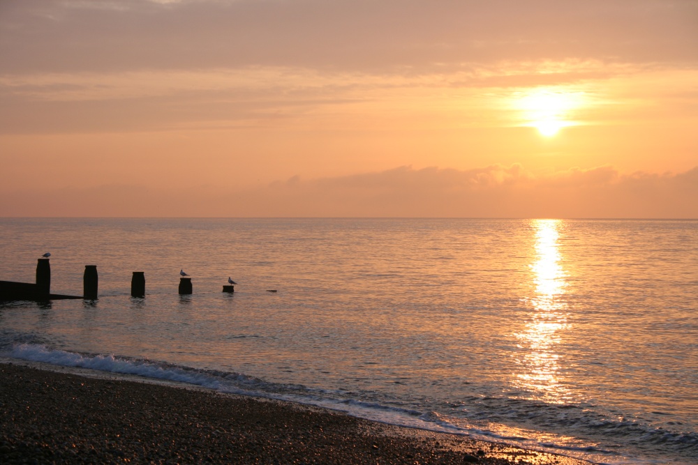 Eastbourne beach as the sun starts to rise