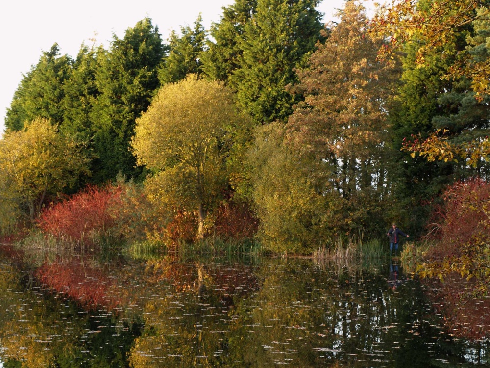 Man fishing at Jubilee Lake, Steeple Claydon, Bucks