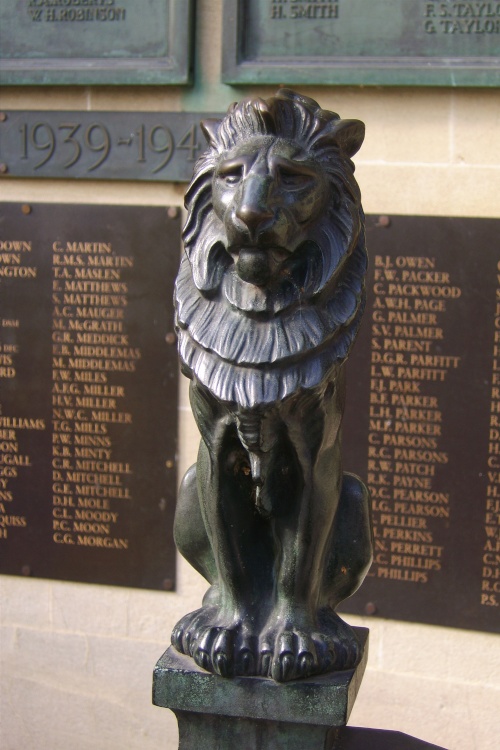One of the small guarding lions of the War Memorial, Bath, Somerset