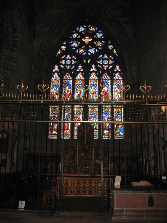 The altar and the stained glass in St. Wilfrid's Chapel