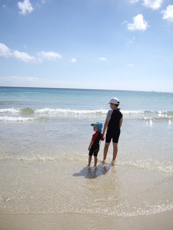 Taking care of his little brother