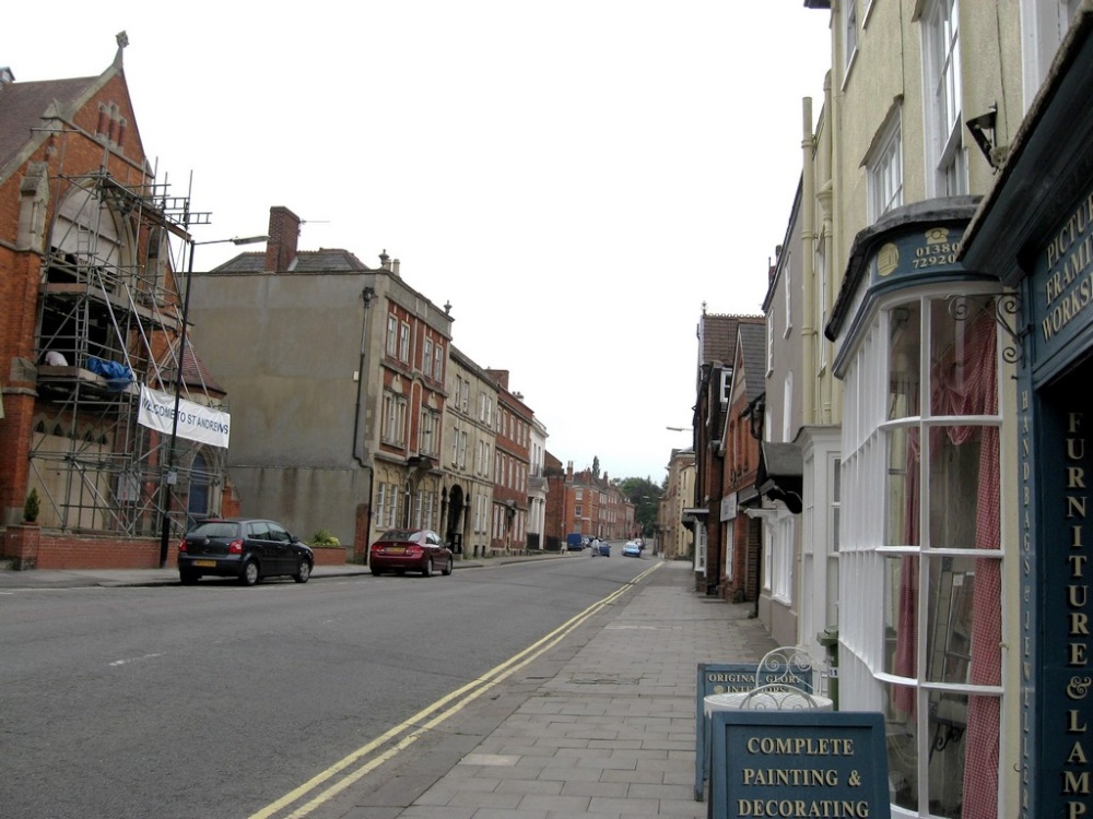 Storm-Damaged Window being replaced in Church on  the Left of the Road