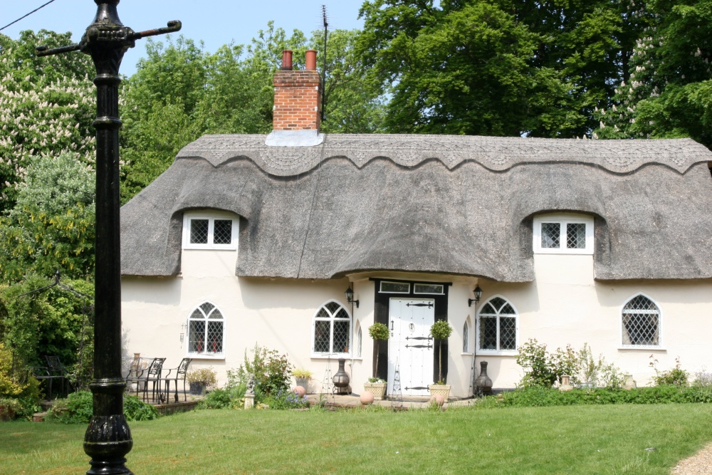 Photograph of Thatched village cottage
