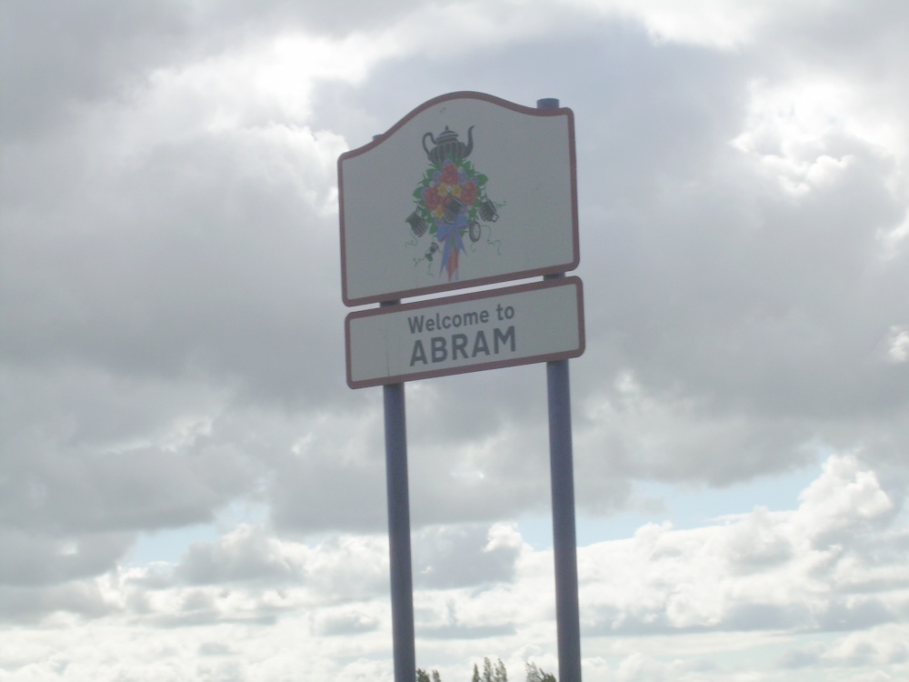 Photograph of Our Village sign