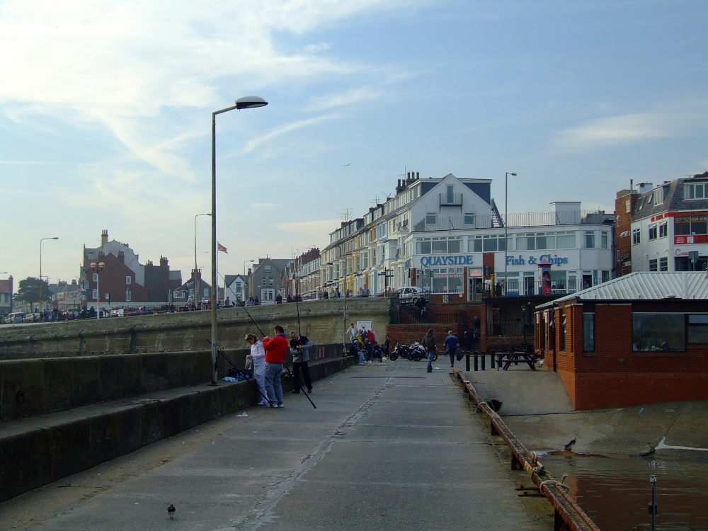 Fishing from the harbour wall, Bridlington