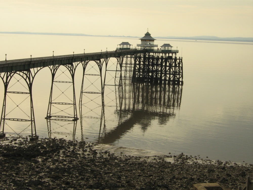Photograph of Hazy sunset view of pier