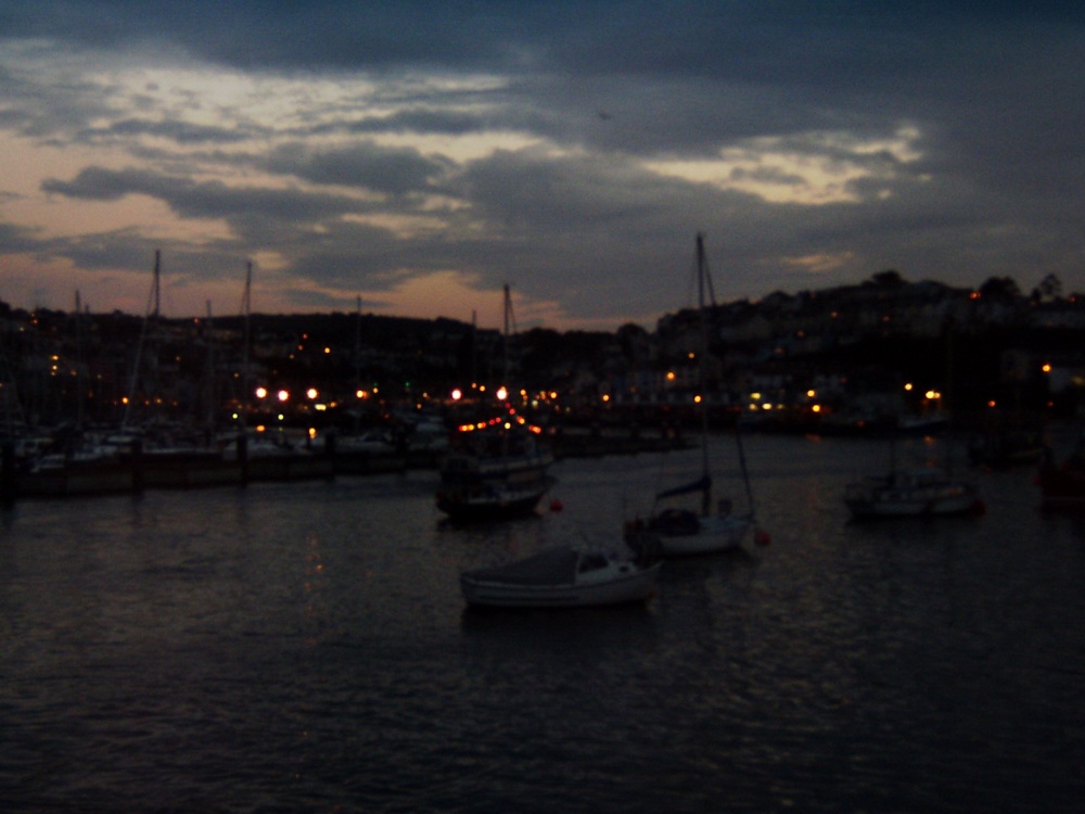 Brixham harbour at dusk.