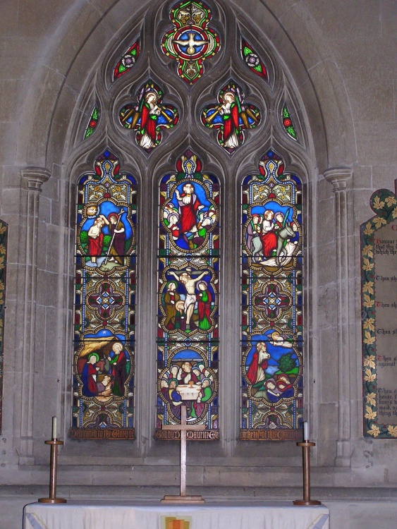Altar and stained glass at St George's, Preshute