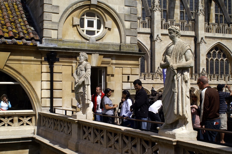 Statues guard the walkways.