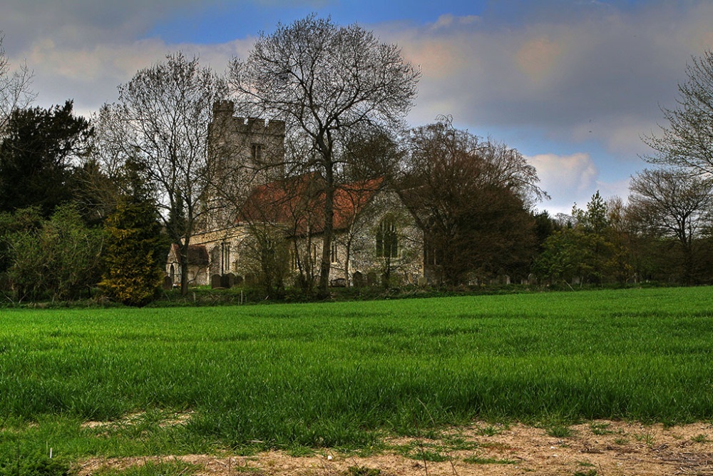 Challock Church through trees