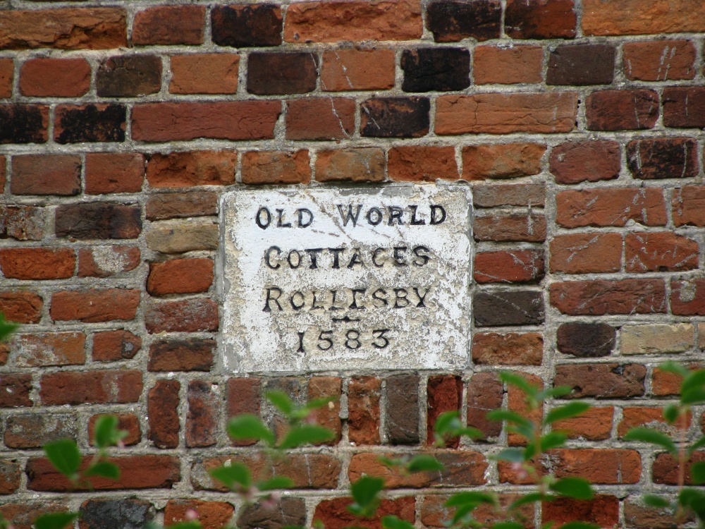 Photograph of Plaque on a house near the Church, house was surrounded by trees which prevented a picture of it