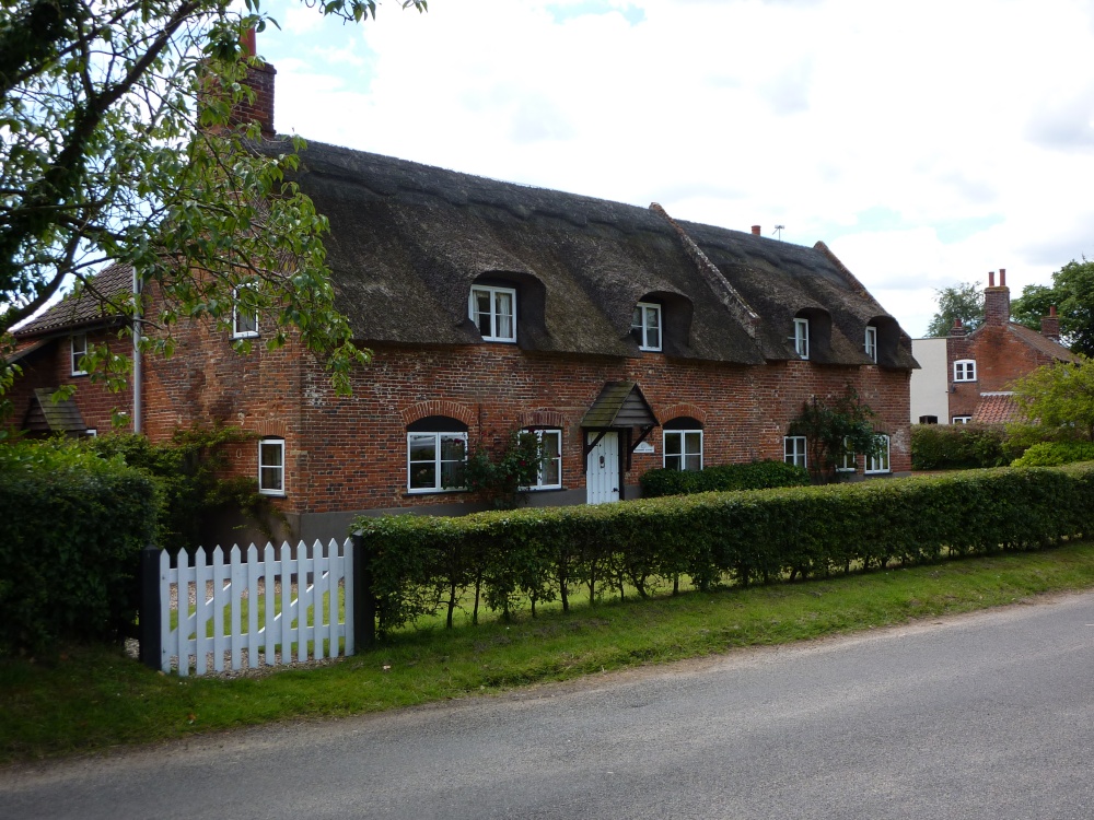 Photograph of Woodbastwick thatched cottages