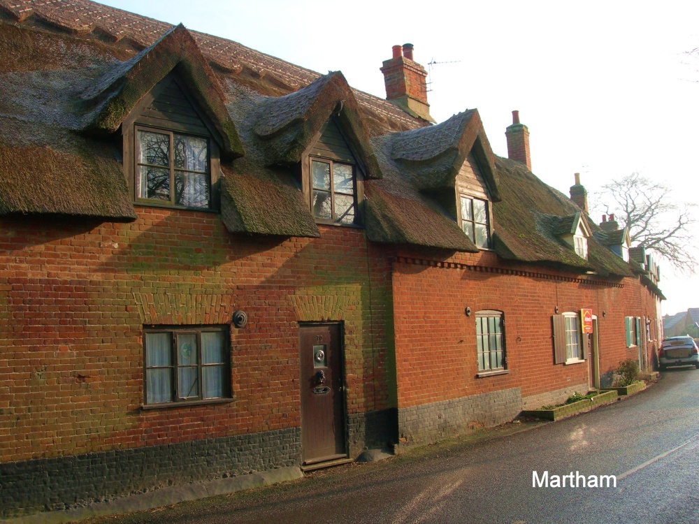 Photograph of Very old Cottages near the Church.