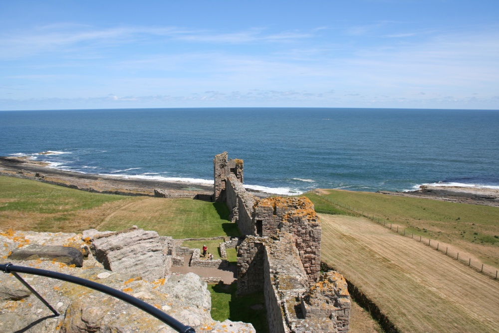 The coast of Northumberland from Dunstanburgh Castle photo by Simon Larkins
