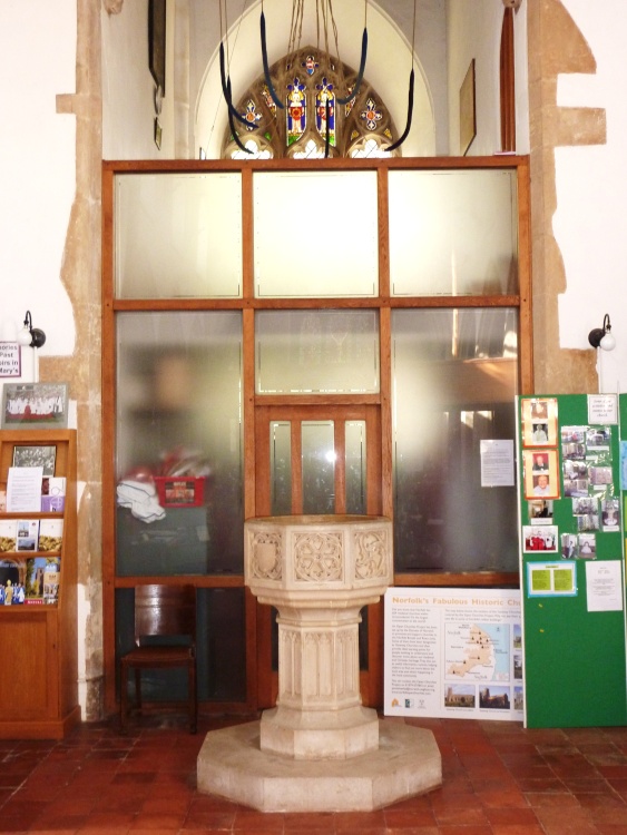 The Font, Bellropes and a section of the stained glass window