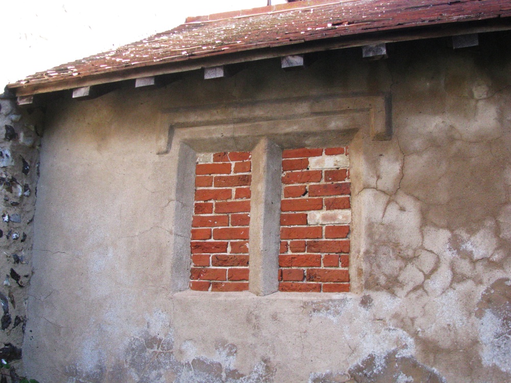Photograph of An unbreakable Church porch window